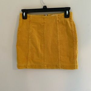 Yellow corduroy zip up mini skirt